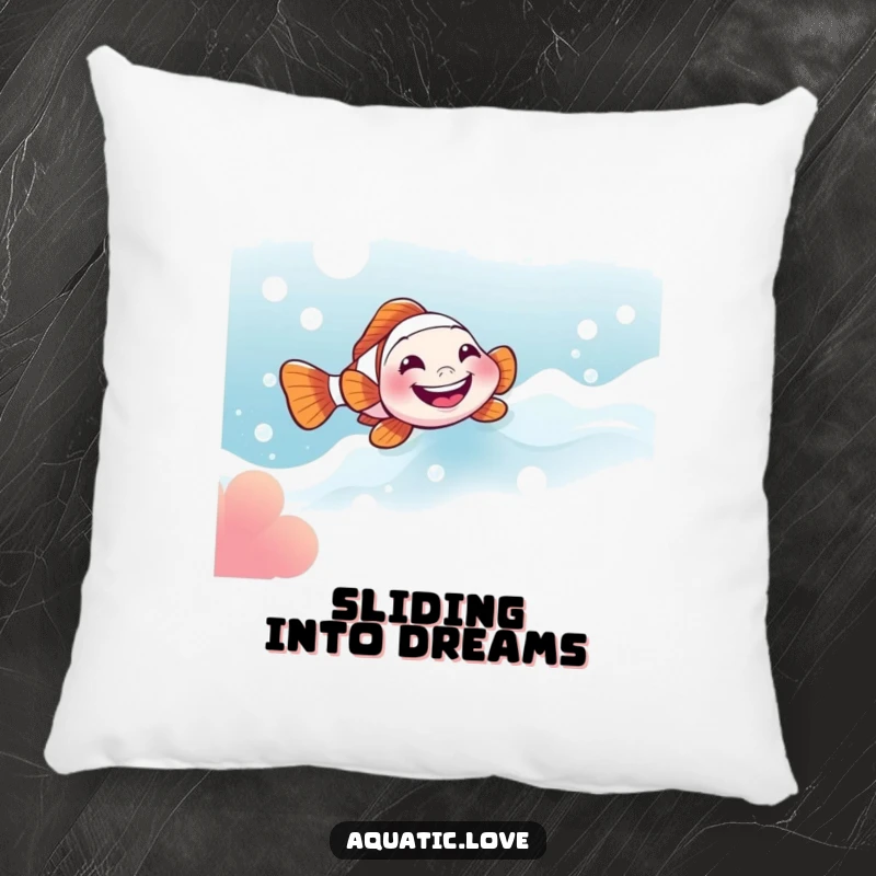 Funny pillow featuring a little clownfish with a wide grin sliding down a bubbly current, offering comfort and a cheerful splash.