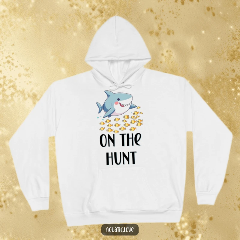 Funny hoodie featuring a playful shark with small fins playfully chasing tiny fleeing fish, perfect for cozy fun.