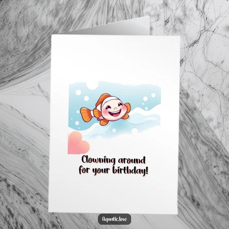 Funny Free Printable Birthday Card: A little clownfish with a huge grin joyfully slides down a current filled with playful bubbles.