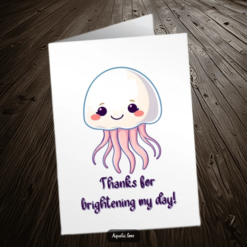 Free Printable Thank You Card: Smiling jellyfish character gently pulsating with soft light, conveying heartfelt thanks.
